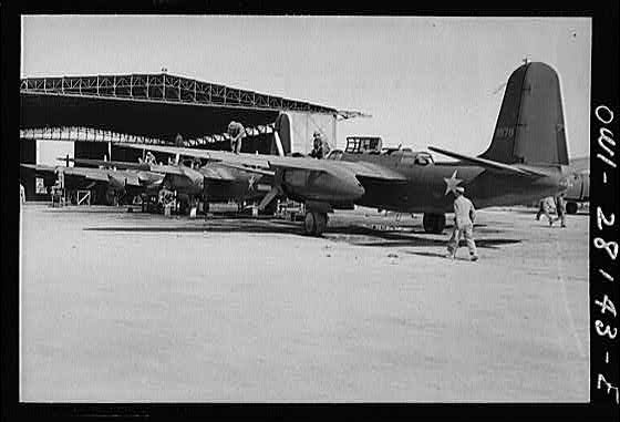 Somewhere in Iran. American assembly plant for light bombers where warplanes are given a final check before delivery to Russia.