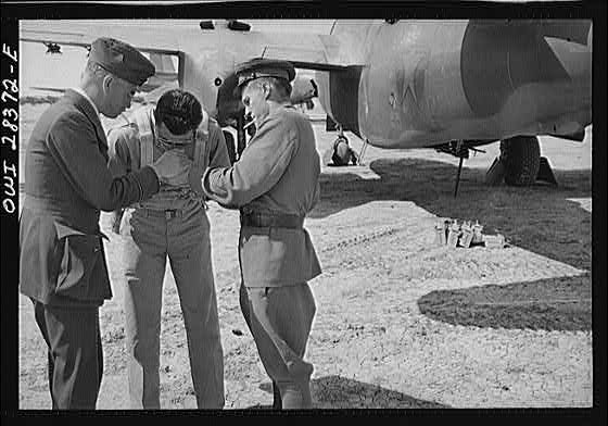 American, Russian and Royal air force pilots at a delivery point of Allied warplanes to the Russians somewhere in Iran.
