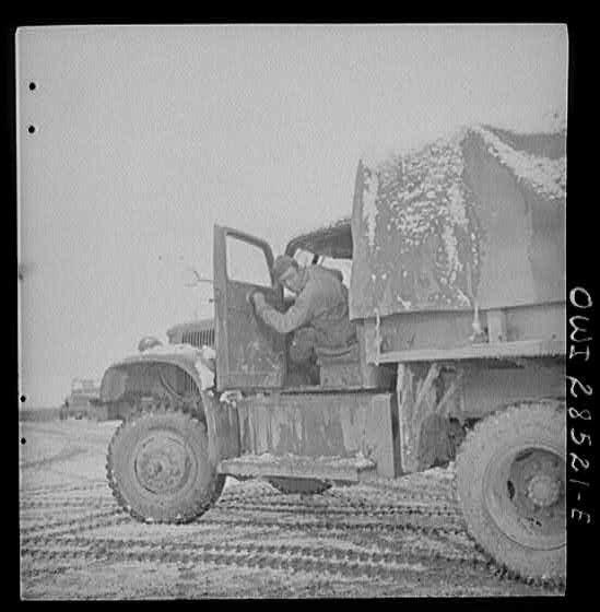 Somewhere in the Persian corridor. A United States Army truck convoy carrying supplies for Russia. Ready to start.