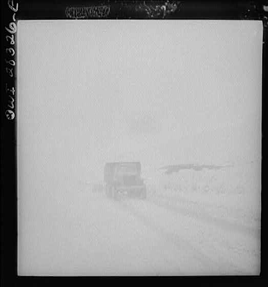 Somewhere in the Persian corridor. A United States Army truck convoy carrying supplies for the aid of Russia making a risky climb over a mountain pass.