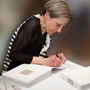 Maryam Khosrowshahi signs one of her books