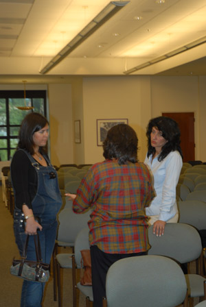 People chatting after the lecutre (September 16, 2006) - by QH