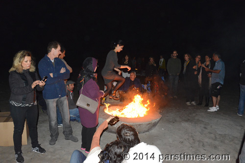 Woman jumping over the fire, LA (March 18, 2014)  - by QH