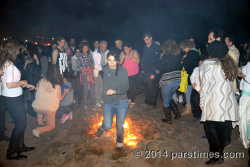 Woman jumping over the fire, LA (March 18, 2014)  - by QH