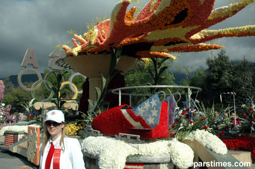 Tournament employee standing by the Home Depot's Float '