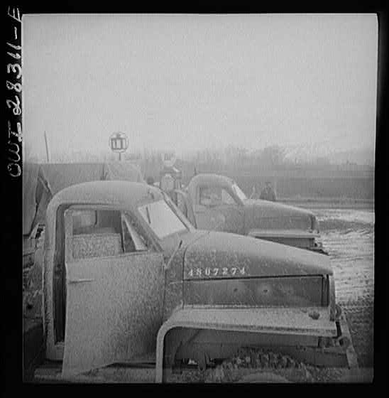 Somewhere on the Persian corridor. A United States Army truck convoy carrying supplies for the aid of Russia at a fueling point.