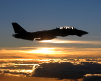 An F-14D Tomcat conducts a mission over the Persian Gulf - Courtesy of US Navy