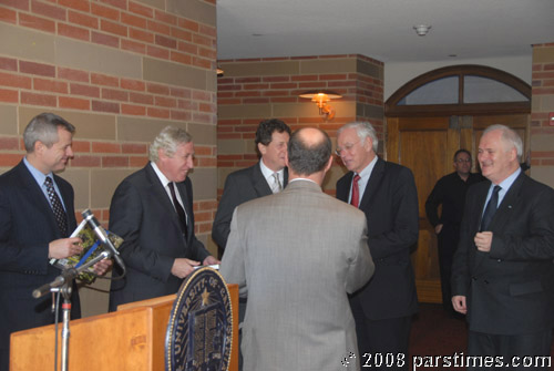 Prof. Tim Stowell presenting appreciation plaques to the EU Ambassadors