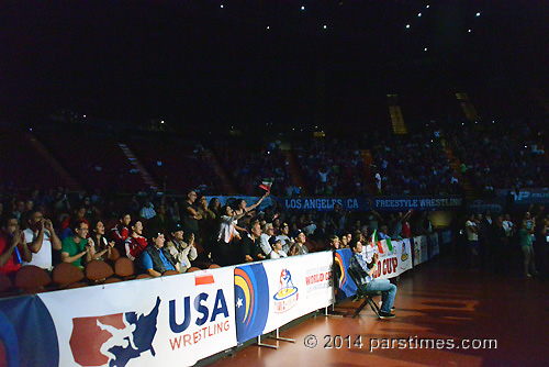 Fans cheering the Iranian national wrestling team